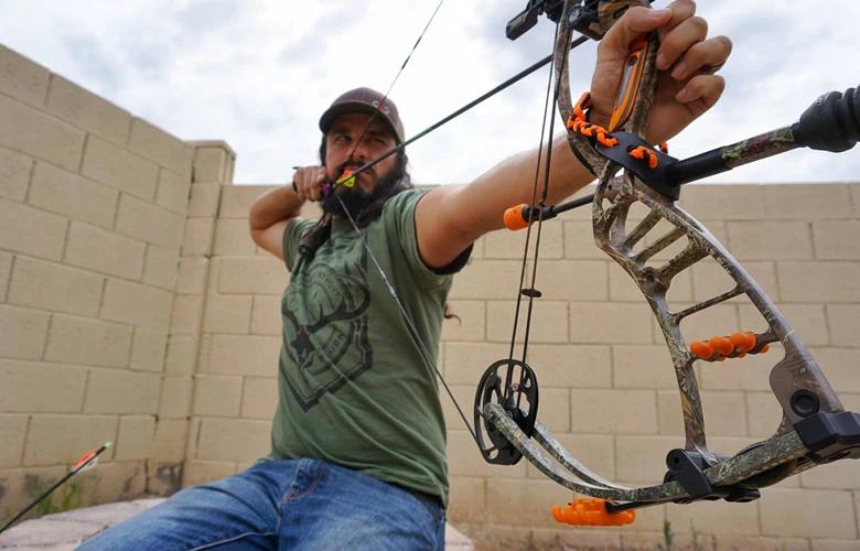 Josh kirchner at full draw with his hoyt nitrum bow 1
