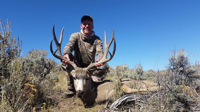 Travis scofield utah mule deer taken with sportsmans hunting adventures