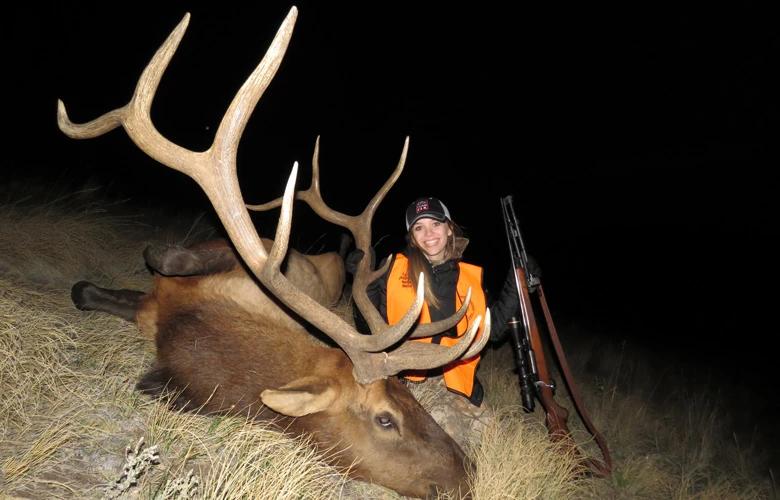 Maddy with a great Montana bull elk taken with Northern Rockies Outfitters — A goHUNT Business Member