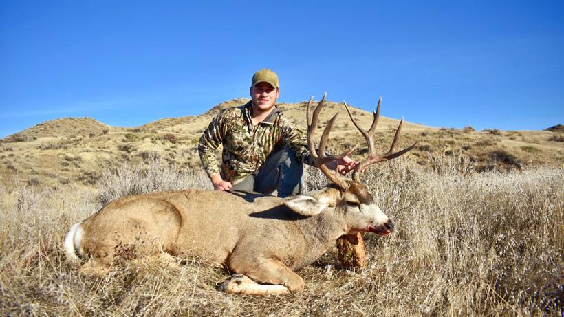 Dylan downson with his 2018 montana mule deer