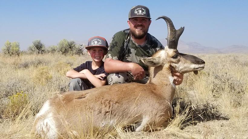 US veteran and their child with a harvested nevada antelope