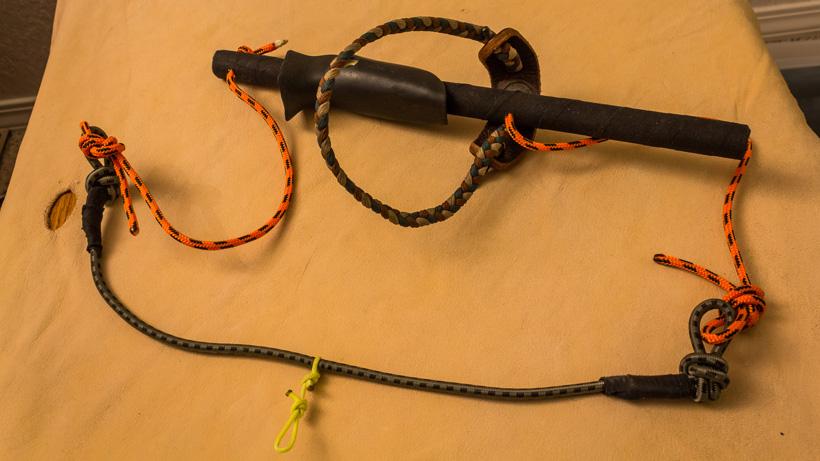 Archery shot execution string trainer