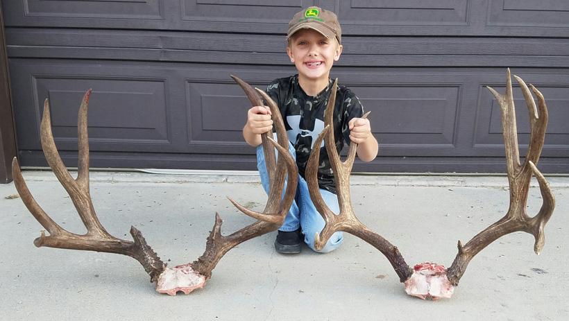 Dawson with both of the Wyoming mule deer racks