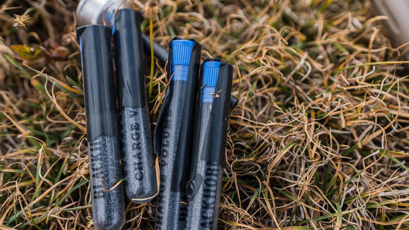 Taped up Blackhorn 209 muzzleloader powder charge tubes