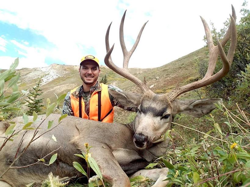 Dano with his colorado muzzleloader mule deer