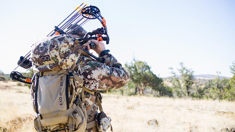 Josh kirchner glassing with a bow on his back