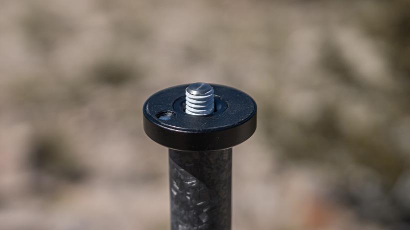 Tripod stud placed back in tripod with teflon tape