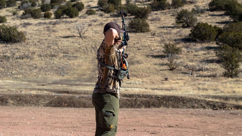 Archery practice with hunting clothes on