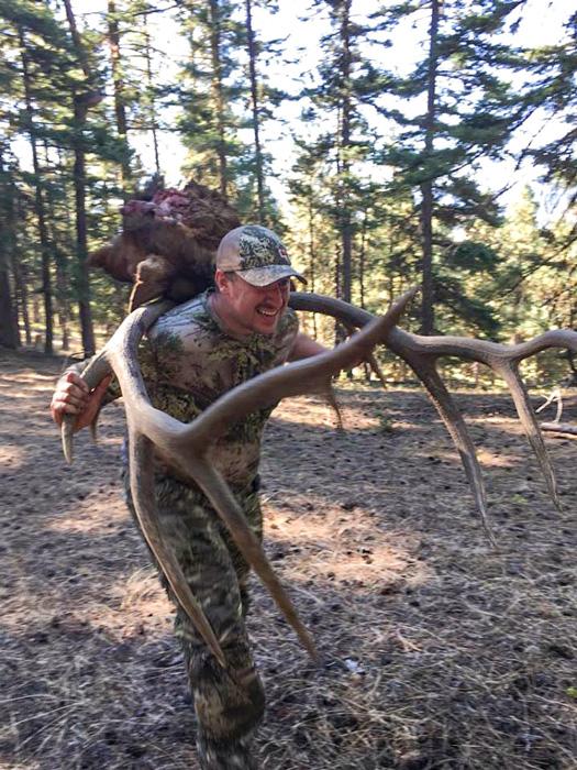 Packing out a giant elk in washington