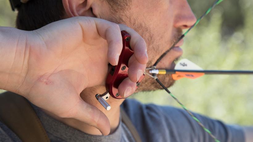 Demonstrating the proper bowhunting release for beginners
