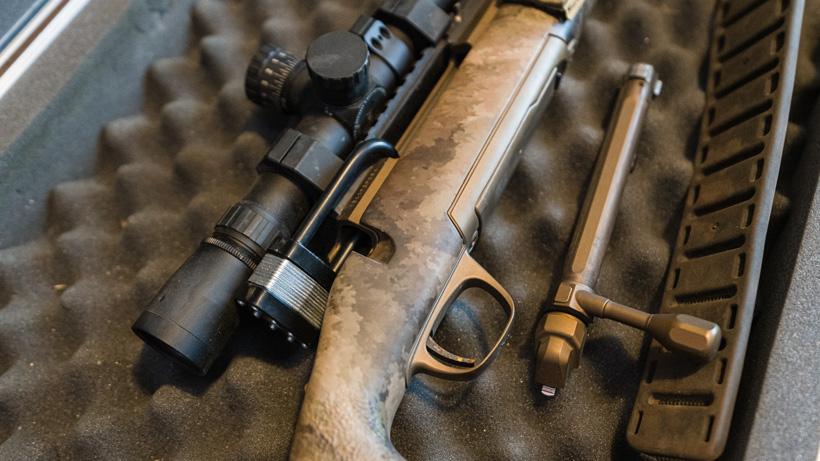 Lock through rifle action