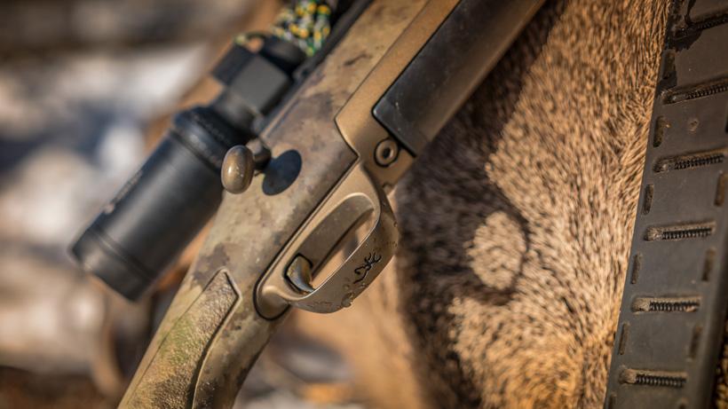 Browning x bolt rifle closeup with elk
