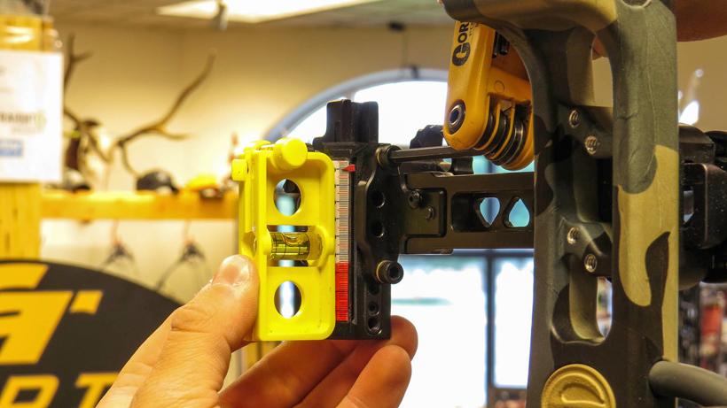 Setting the first axis sight level on a bow