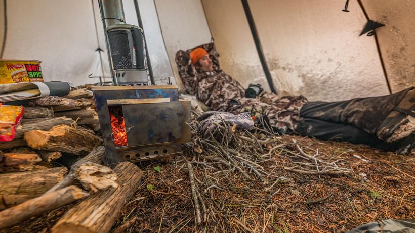 Melting snow on Seek Outside Stove