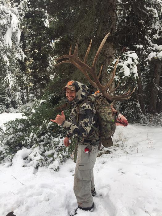 Steve greanias packing out his wyoming elk