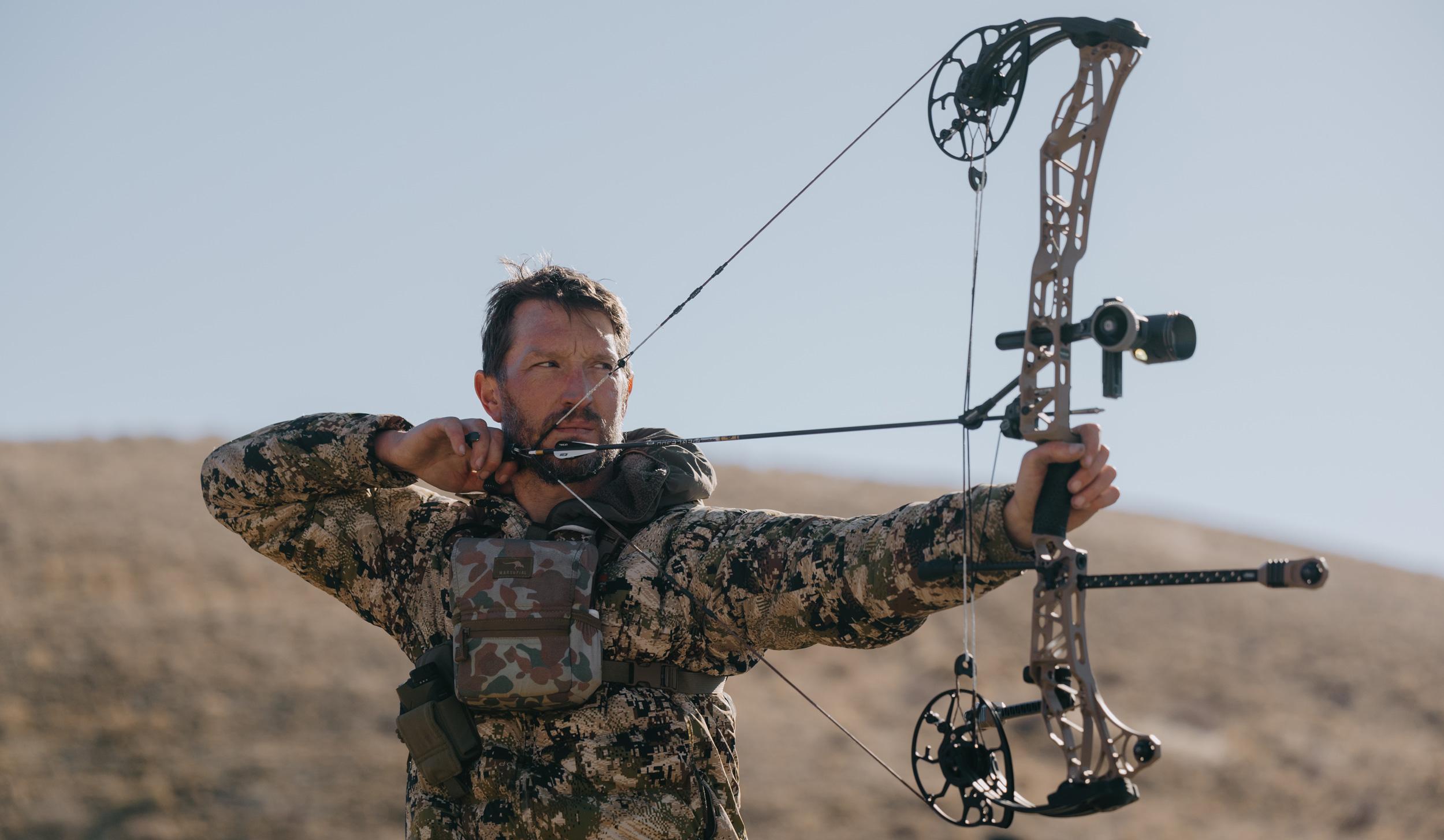 Trail Kreitzer archery practice at hunt camp