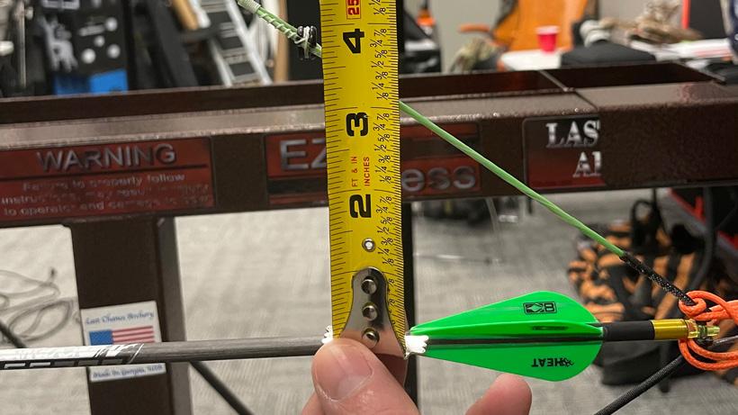 Measuring arrow to peep
