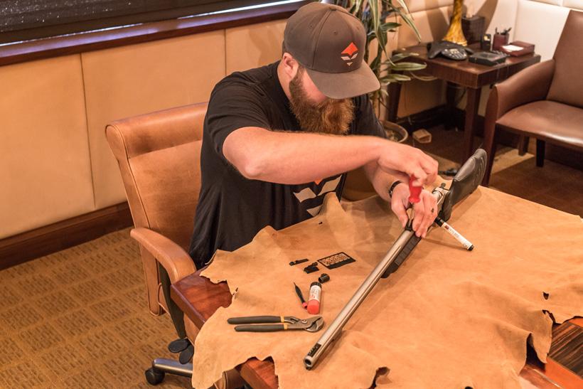 Brandon Evans removing old muzzleloader sights