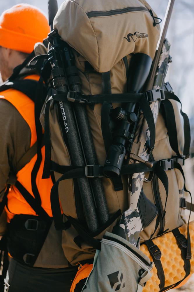 Tricer AD tripod on the outside of Stone Glacier backpack