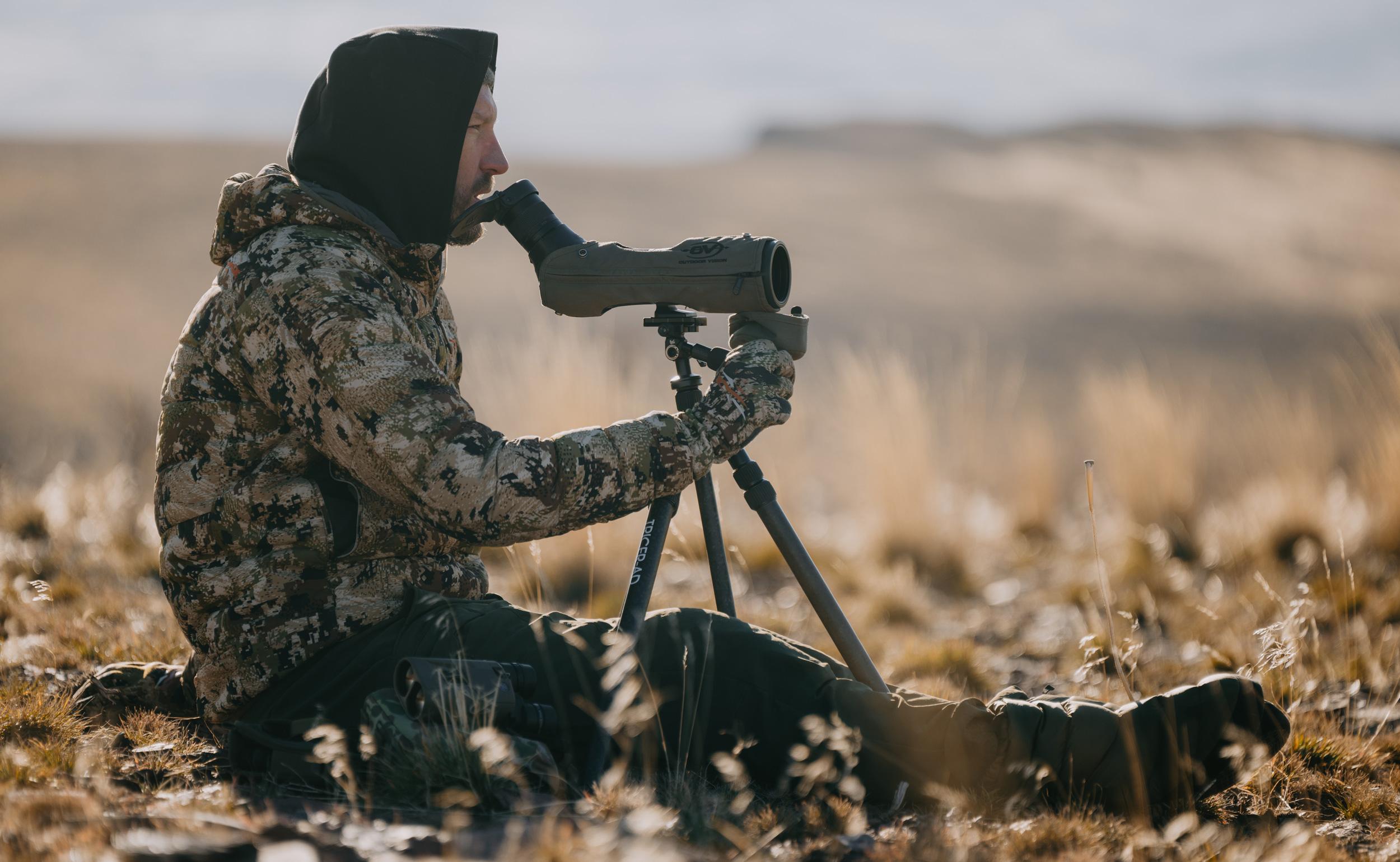 Trail Kreitzer wearing his lightweight insulated booties while glassing