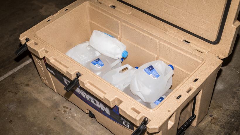Pre cooling a canyon cooler with frozen water jugs