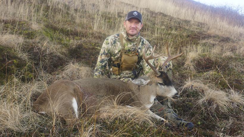 Trail kreitzer with a sitka blacktail