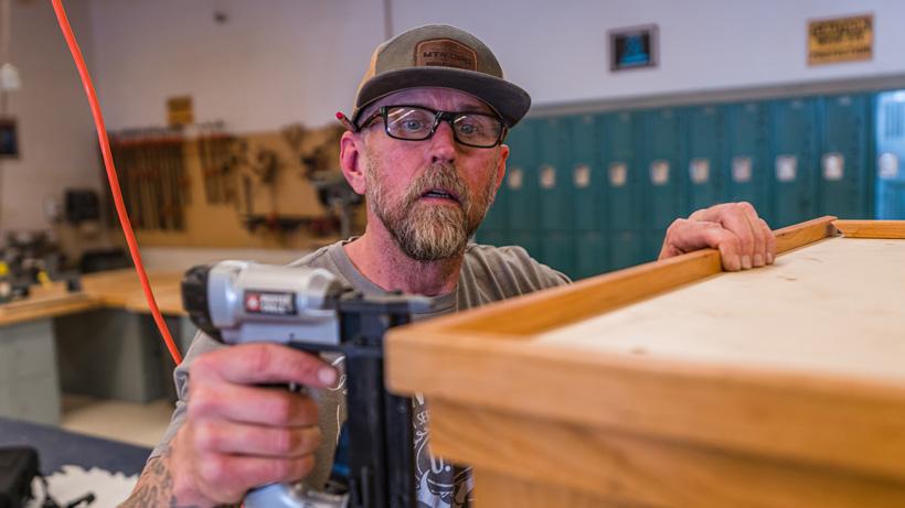 Jimmy nailing down top trim