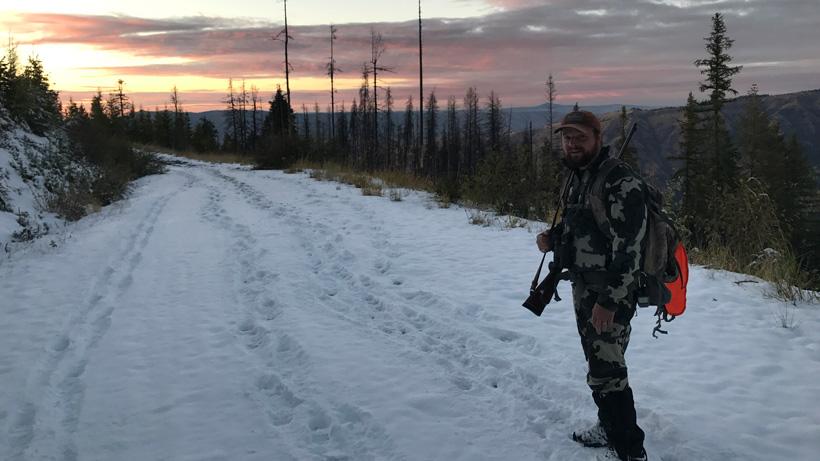 Hunter navigating a snowy road