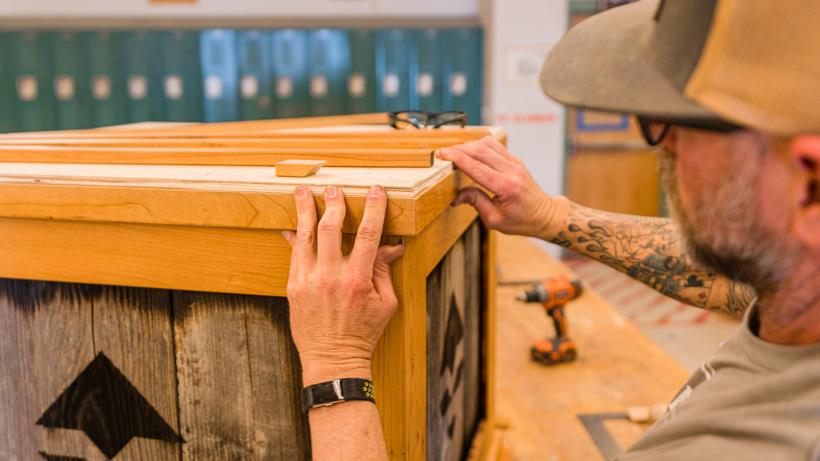 Trim getting nailed down to pedestal