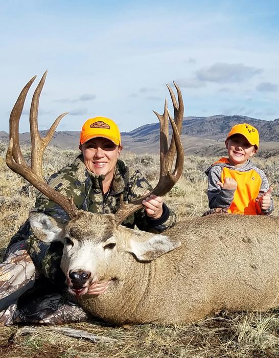 Heather all smiles with her Wyoming mule deer